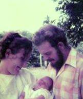 mum, dad and me on the day of my christening